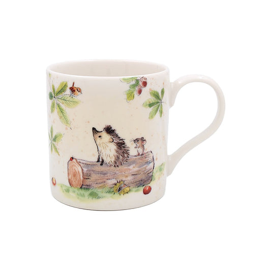 Mug with hedgehog and mouse design on a white background