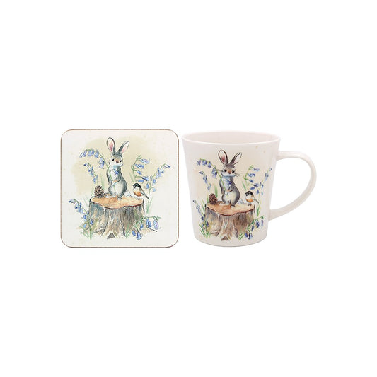 Mug and coaster set with rabbit design on a white background