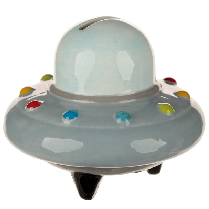 Toy UFO with colorful accents on a white background