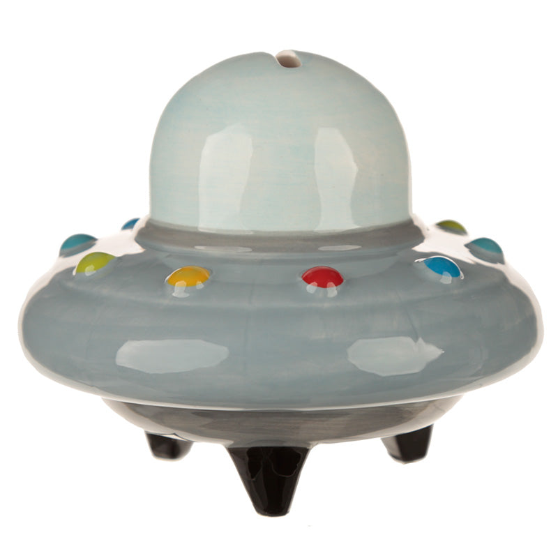 Toy UFO with colorful accents on a white background