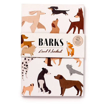 Notebook with dog illustrations and 'Barks' branding on a white background