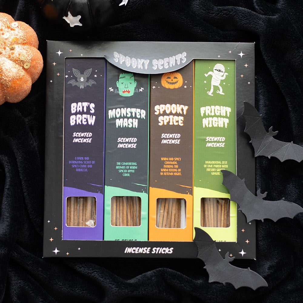 Halloween-themed incense sticks packaging with decorative elements on a dark background