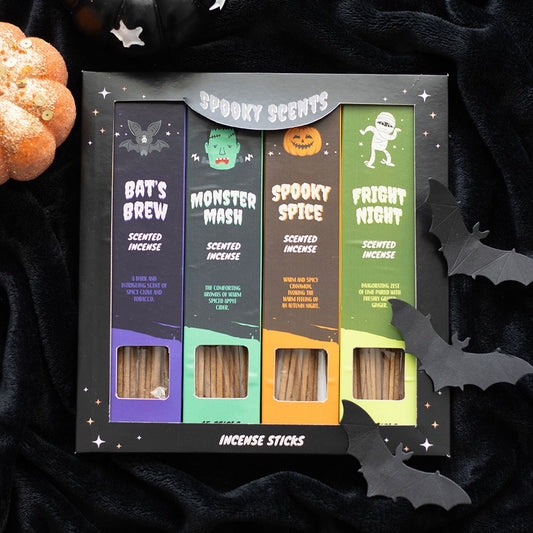 Halloween-themed incense sticks packaging with decorative elements on a dark background