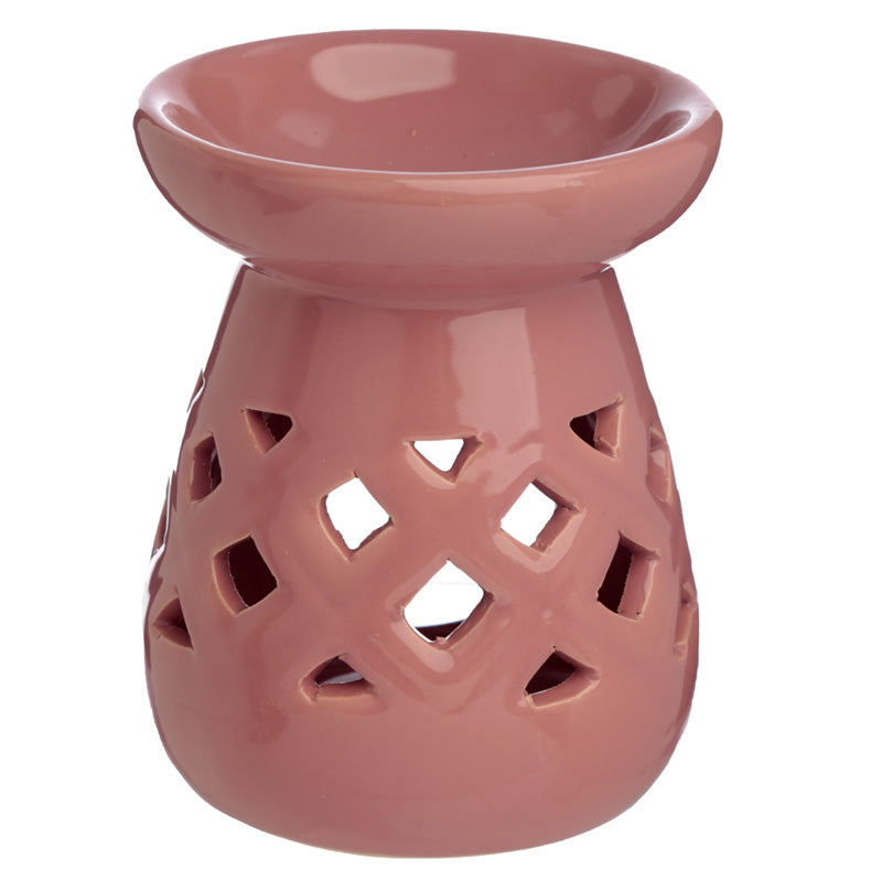 Pink ceramic oil burner with lattice design on a white background