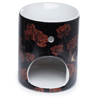 Black container with red rose pattern on a white background