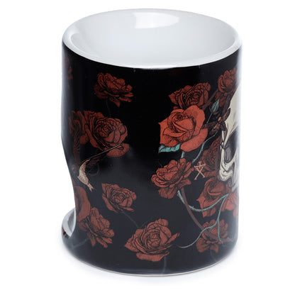 Cylindrical container with red floral design on a black background