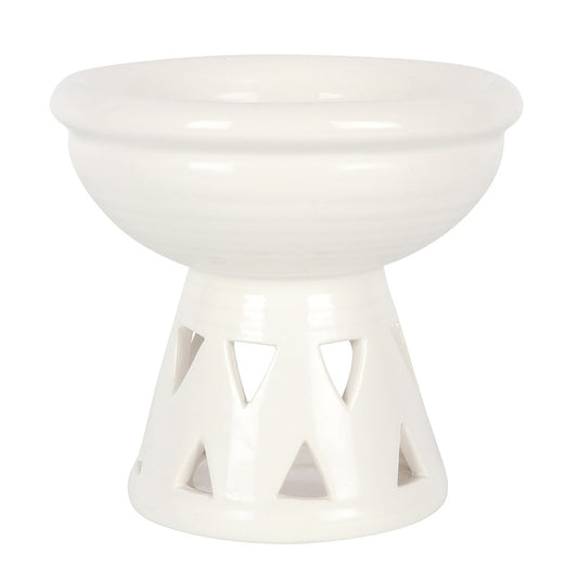 White ceramic bowl with a geometric base on a white background
