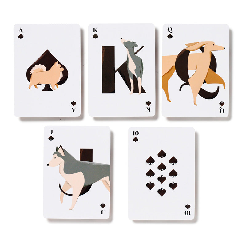 Set of playing cards with dog illustrations on a white background