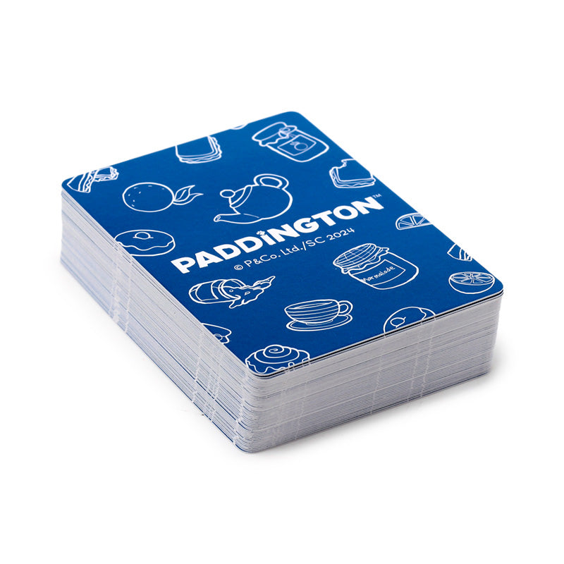 Stack of white cards with blue Paddington branding and illustrations on a white background