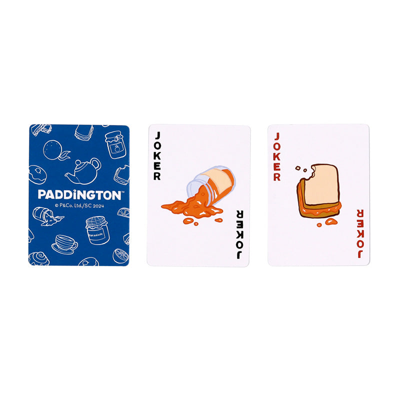 Three playing cards featuring Paddington Bear design on a white background