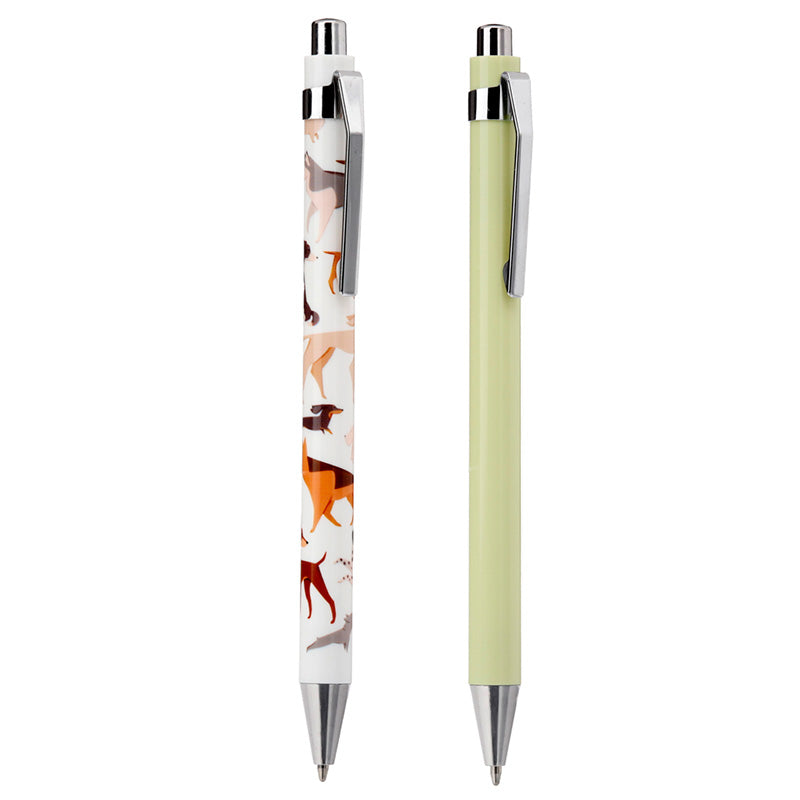Two pens, one with a dog pattern and one plain, on a white background