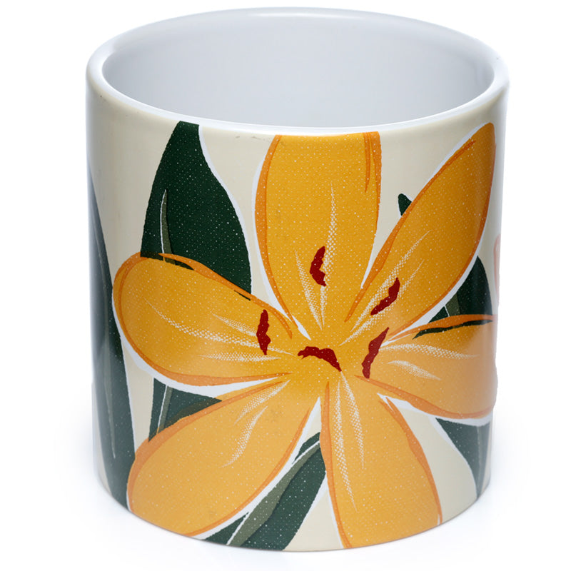 Mug with a floral design featuring yellow flowers and green leaves on a white background