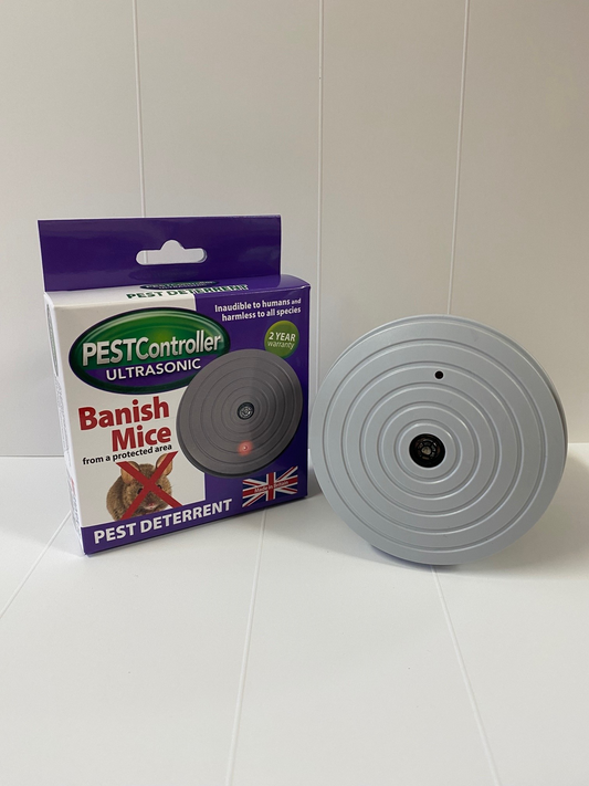 Pest Controller ultrasonic pest deterrent device with packaging on a white surface.