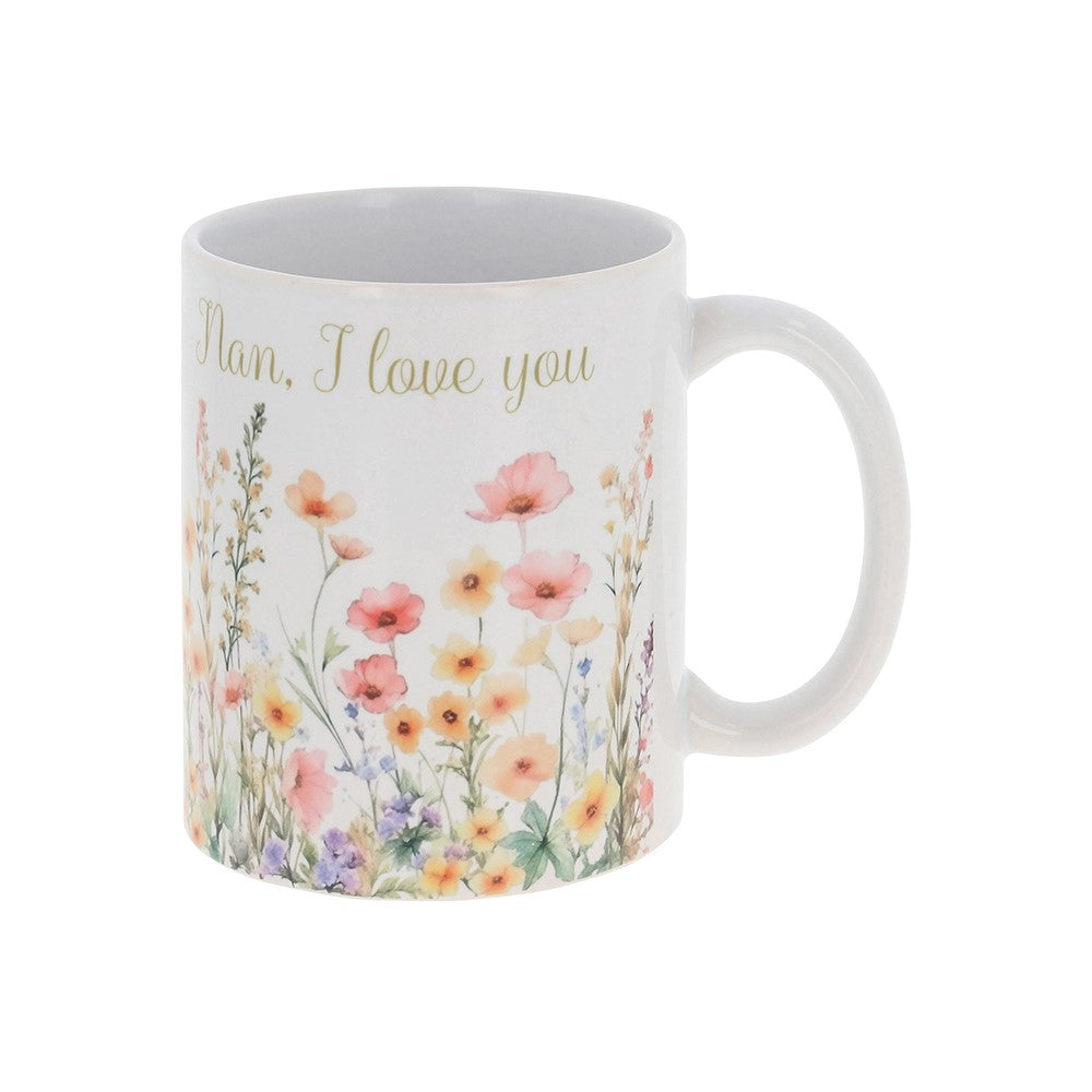 Mug with floral design and 'Nan, I love you' text on a white background