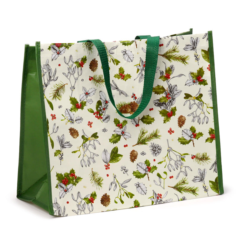 Christmas-themed tote bag with green handles on a white background