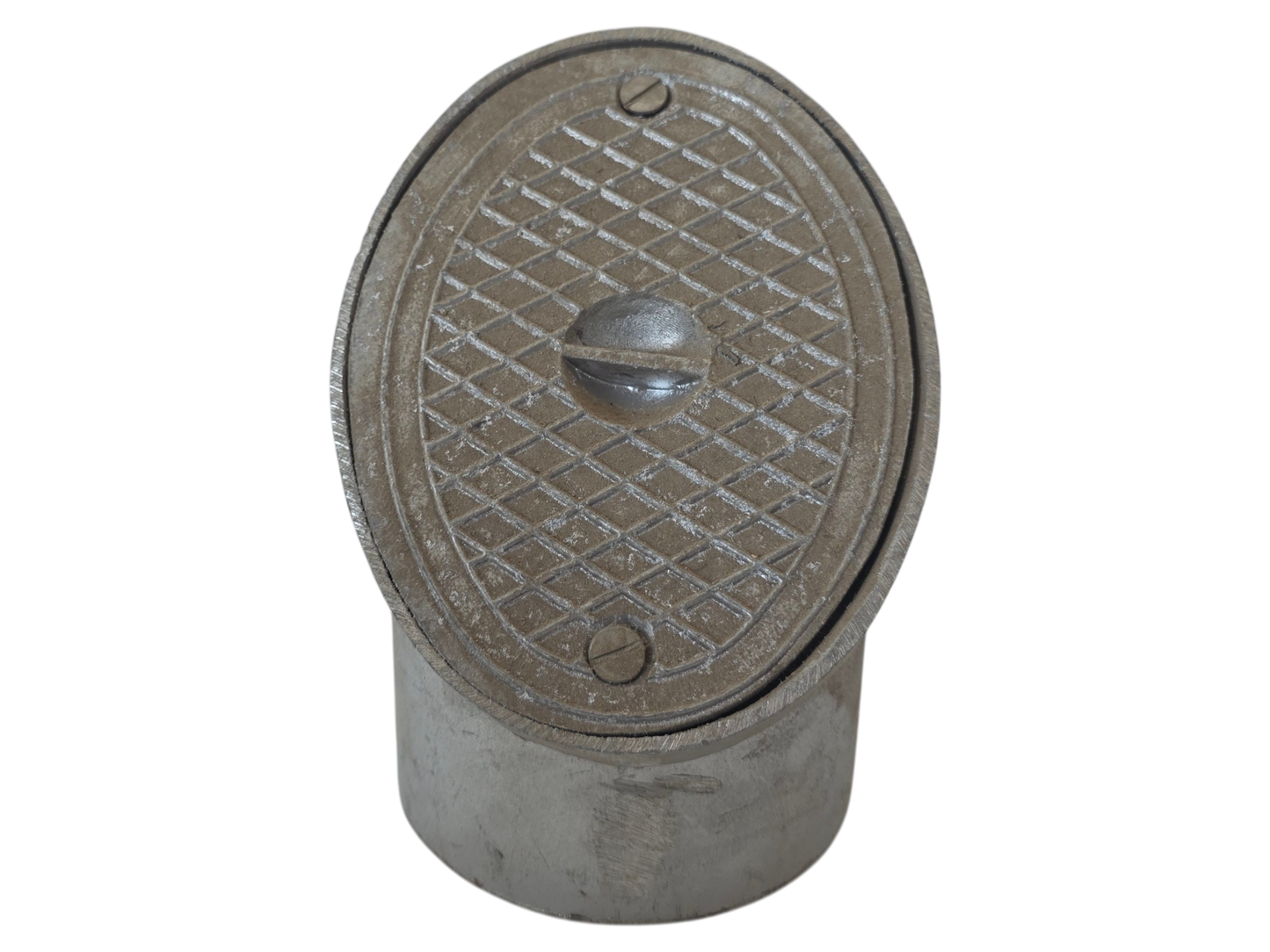 A vintage cast iron plumbing fixture, likely a drain or vent cap, featuring a textured diamond-patterned metal cover with a central handle and two securing screws, set against a plain white background.