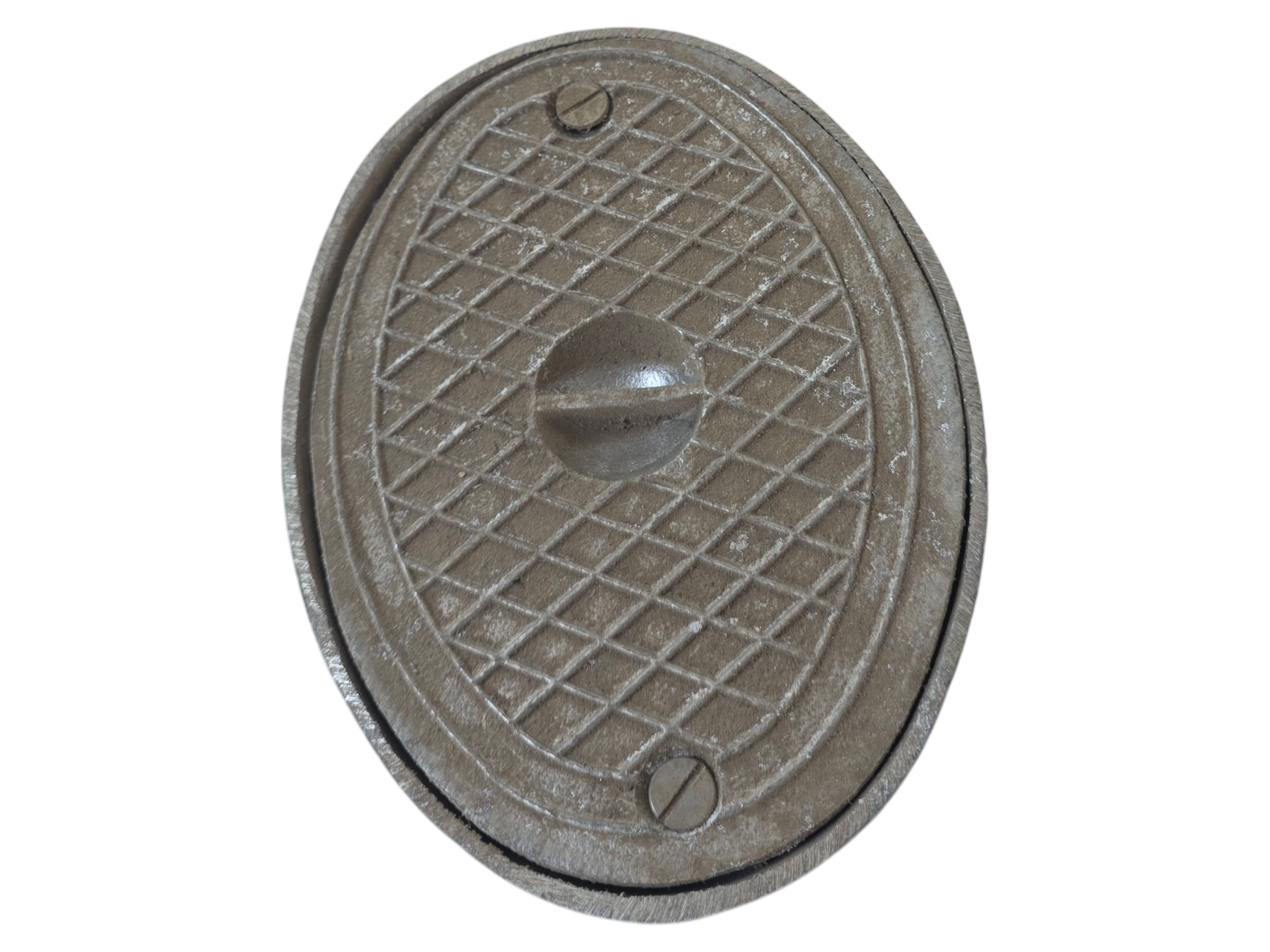 An oval cast iron manhole cover with a textured diamond grid pattern and a central protruding handle, isolated on a white background.