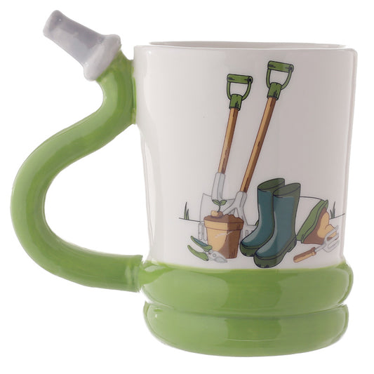 Green mug with a handle featuring gardening tools and boots on a white background