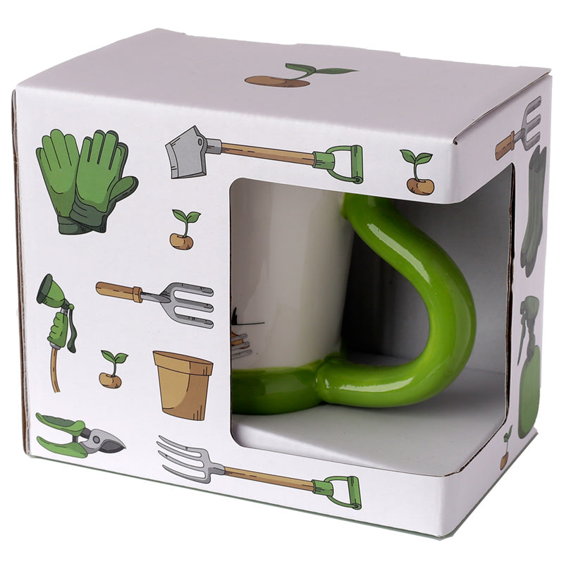 Green-handled ceramic mug with gardening-themed packaging