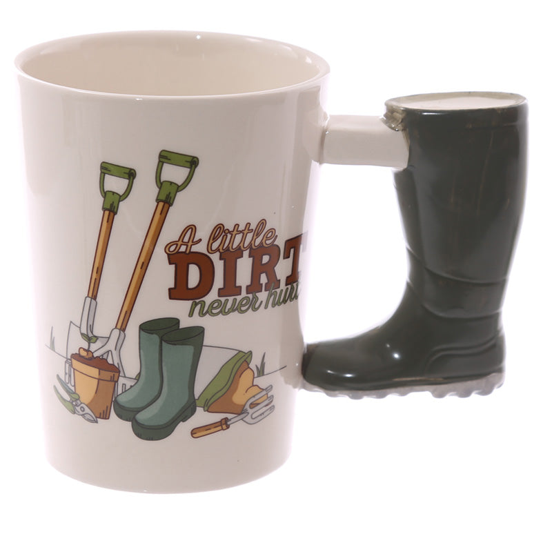 White mug with gardening-themed design and a green boot handle on a white background