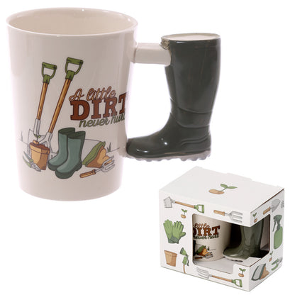 Gardening-themed mug with boots and gardening tools, displayed with packaging.
