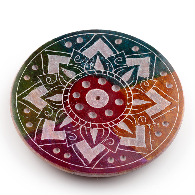 Decorative stone with a colorful mandala design on a white background