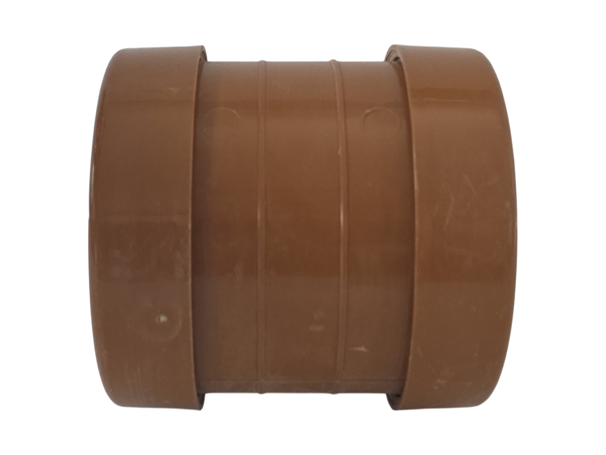 A brown plastic pipe connector fitting with three concentric ridged bands, isolated on a white background.