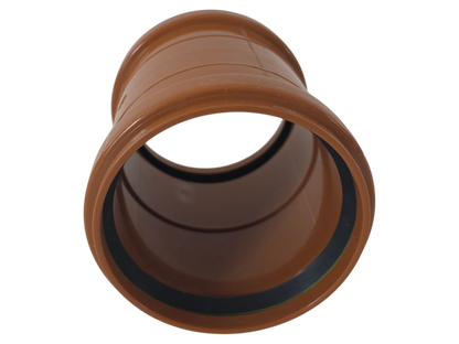 A brown plastic pipe connector fitting with a black rubber gasket visible inside the open end, shown on a plain white background.