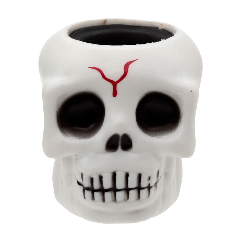 White skull-shaped container with a red symbol on a white background