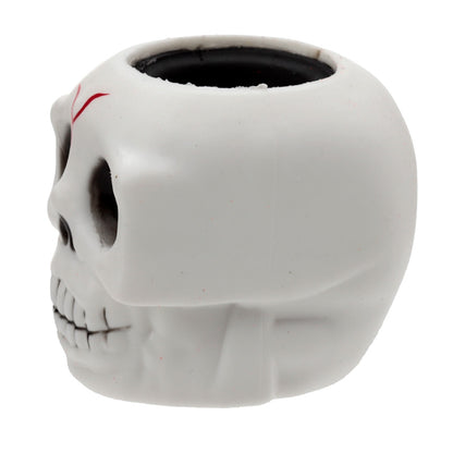 White skull-shaped container on a white background