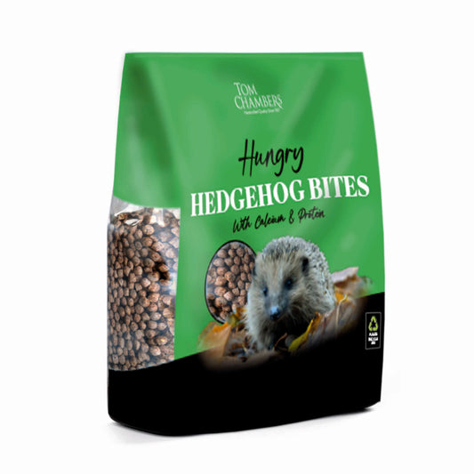 Bag of 'Hungry Hedgehog Bites' with a green label and hedgehog illustration on a white background.