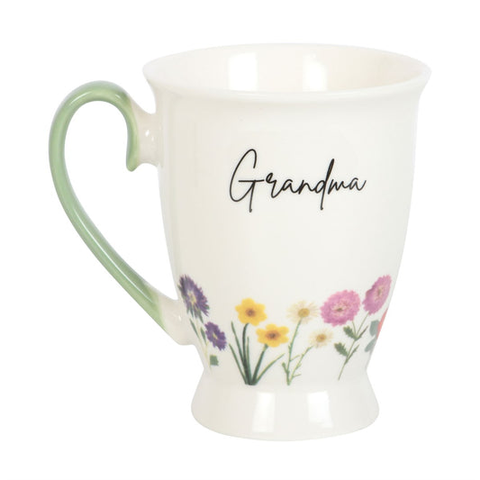 Mug with 'Grandma' text and floral design on a white background