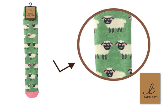 Green sock with sheep pattern on a white background, featuring the Bartleby brand.