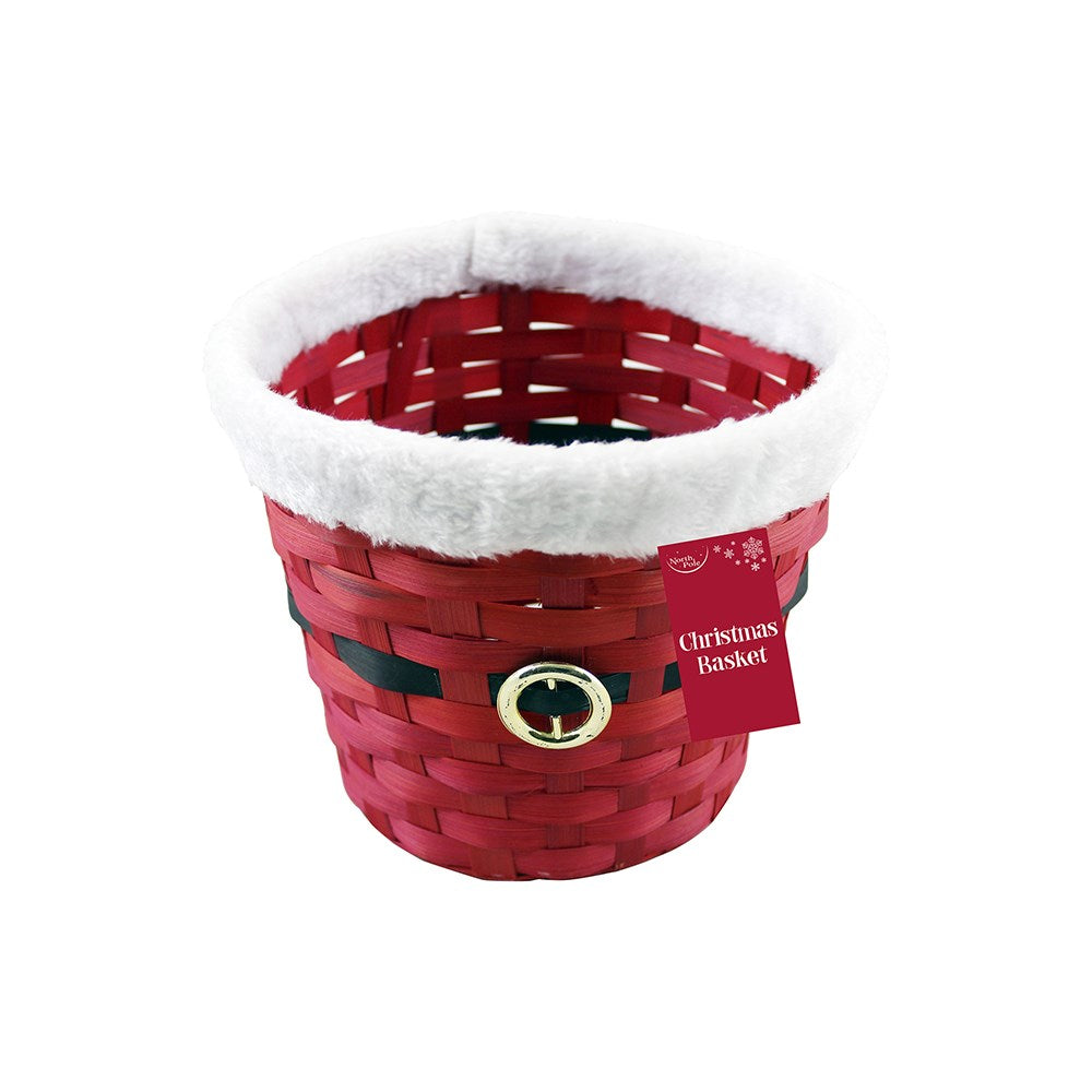 Red Christmas basket with white fur lining and a tag on a white background