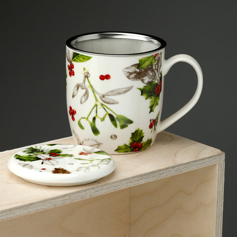 Decorative mug with floral design on a wooden surface