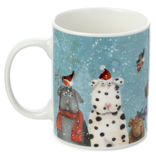 Mug with a winter scene design featuring animals in hats and scarves on a blue background.