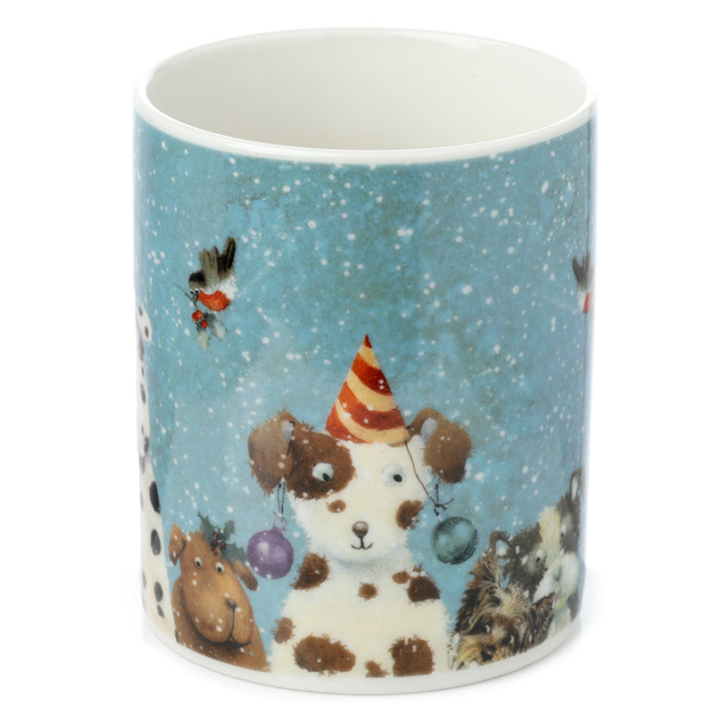 Mug with a festive design of dogs and a party hat on a blue snowy background