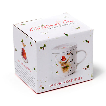 Mug with Christmas highland cow design box on a white background