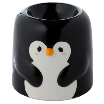 Black mug with a penguin design on a white background
