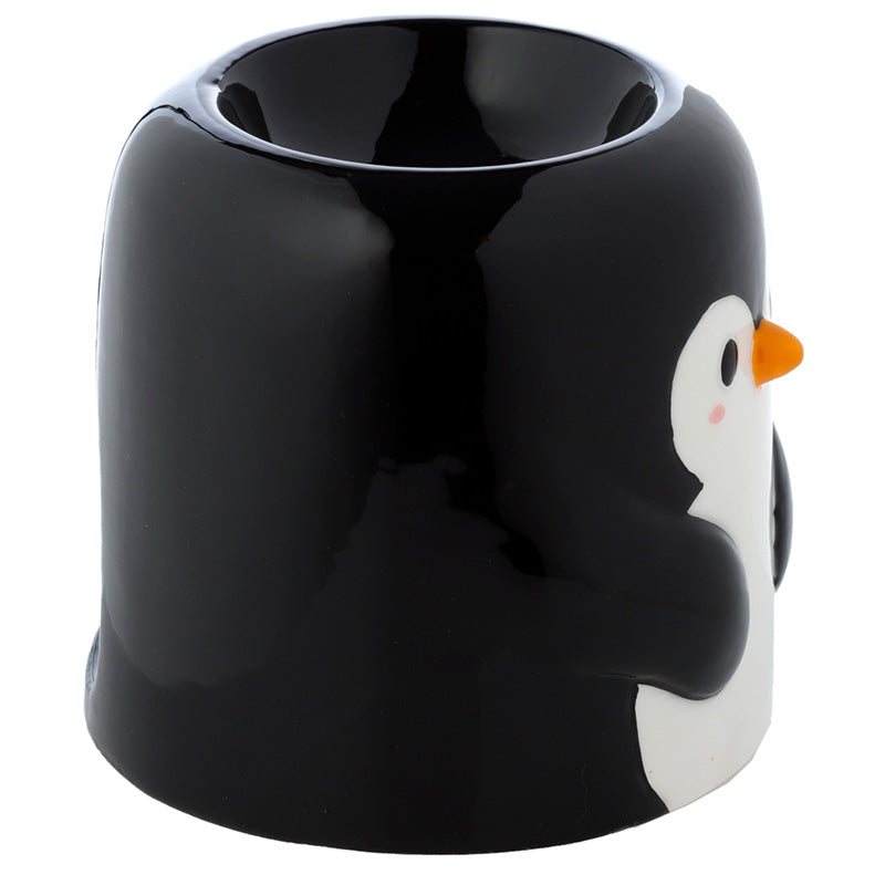 Black mug with a penguin design on a white background