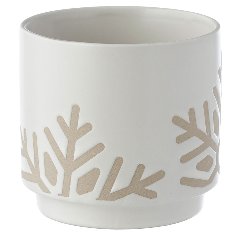 White ceramic pot with beige leaf patterns on a white background