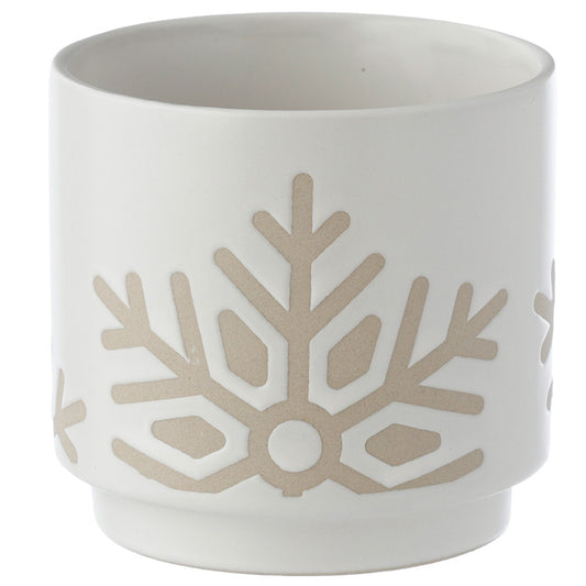 White ceramic pot with beige snowflake design on a white background
