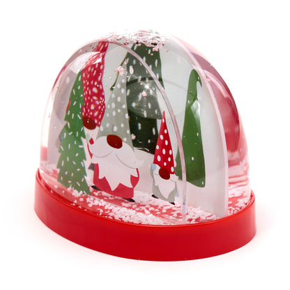 Christmas-themed snow globe with reindeer and trees on a white background