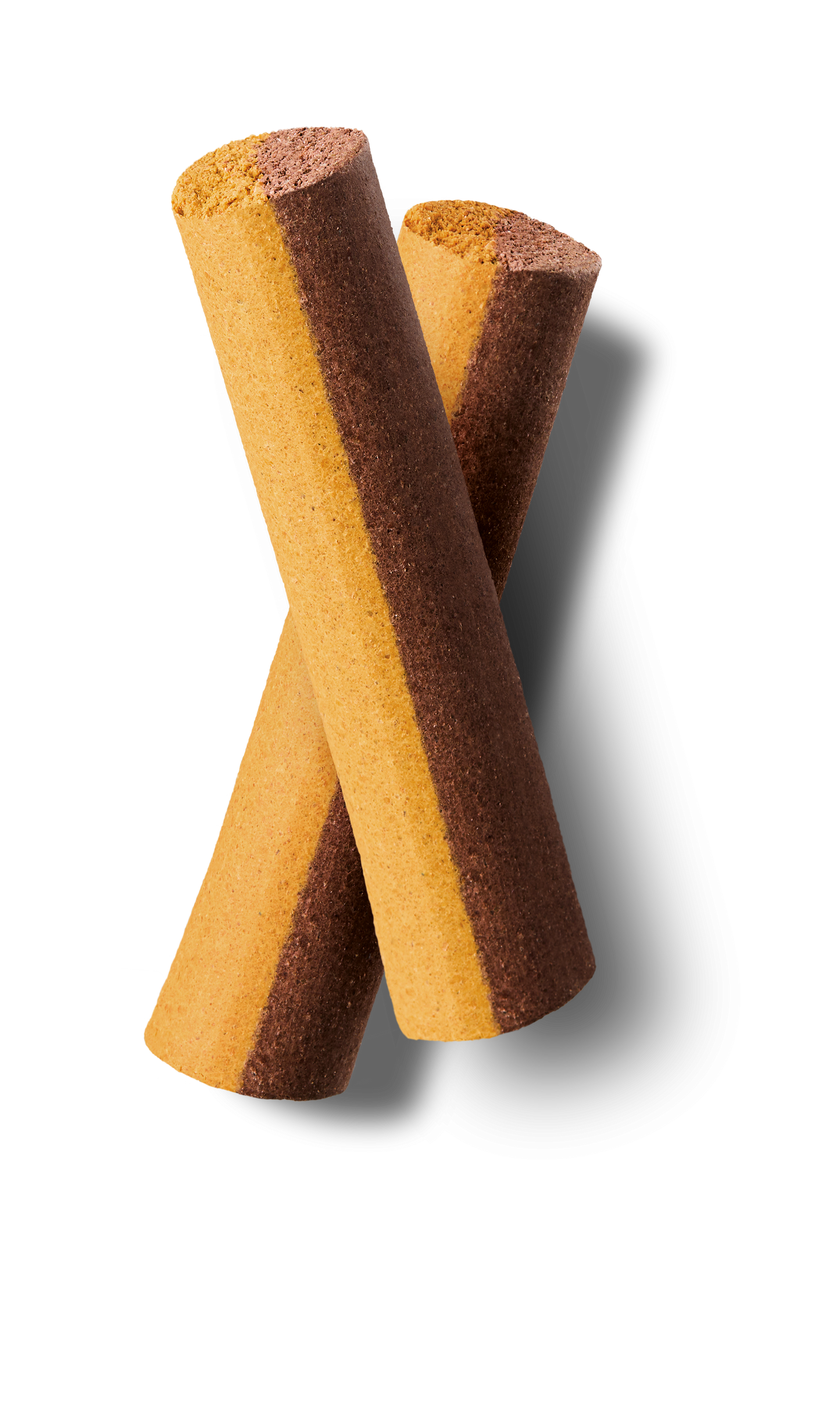Two brown and yellow striped cylindrical cookies on a white background