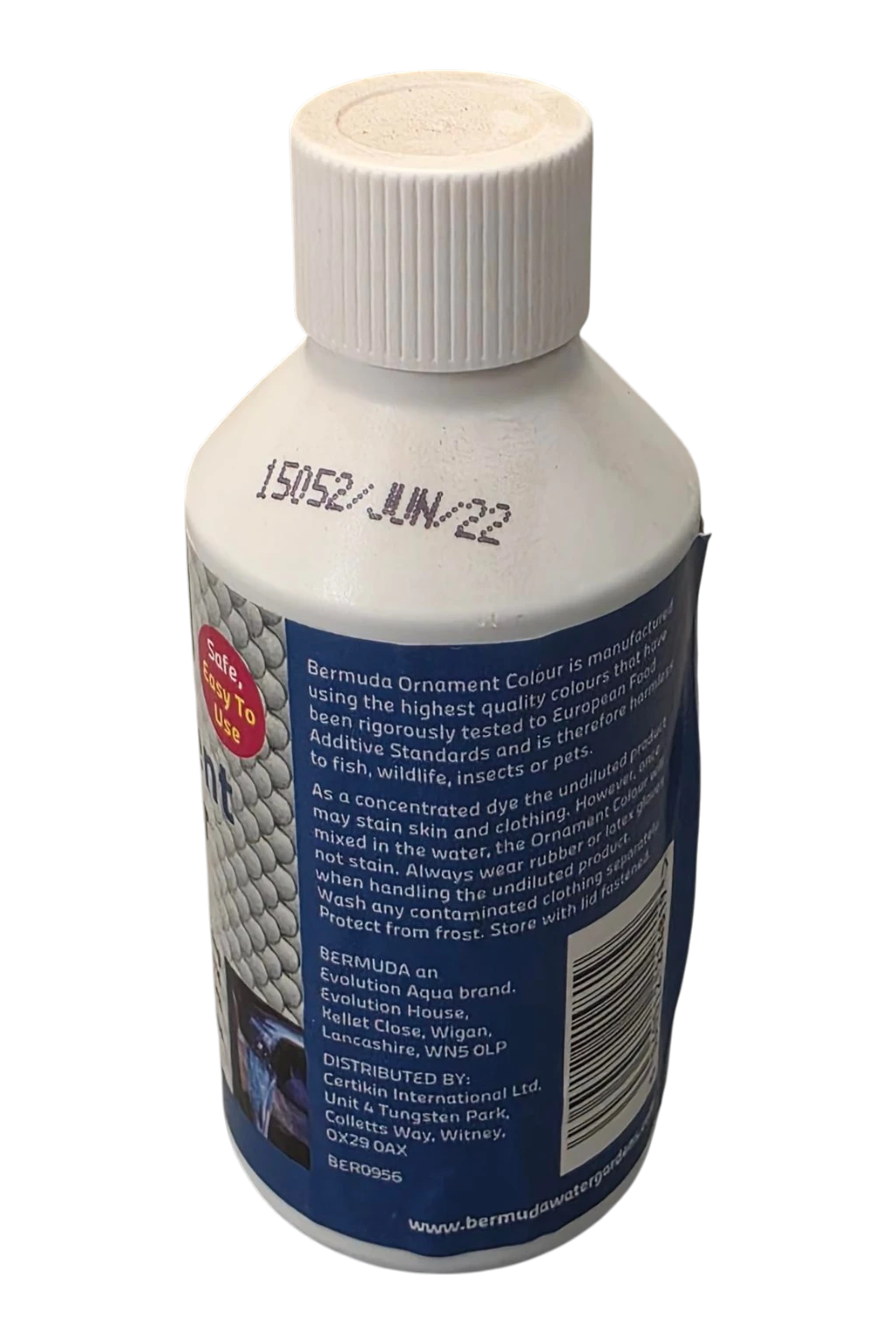 A white plastic bottle of Bermuda Ornament Colour by WMS CLP, showing the back label with product details and handling instructions, on a white background.