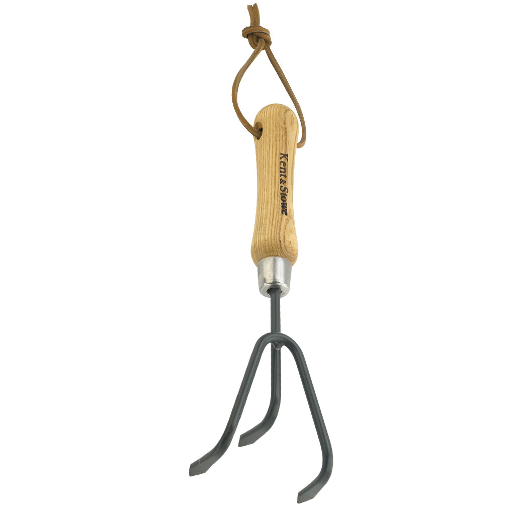 Gardening tool with wooden handle and metal prong on a white background
