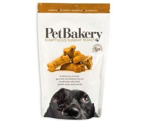 Pet Bakery dog treat package with a dog's face on the packaging.