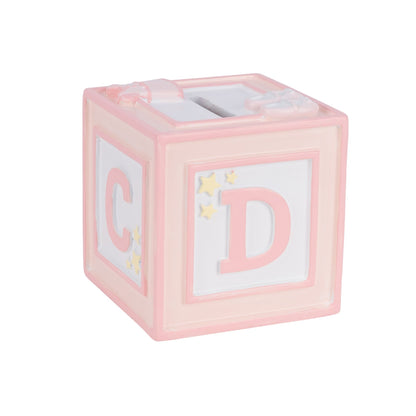 Pink block-shaped tissue box with letters 'C' and 'D' on a white background