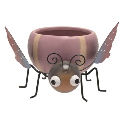 Ceramic planter shaped like a butterfly on a white background