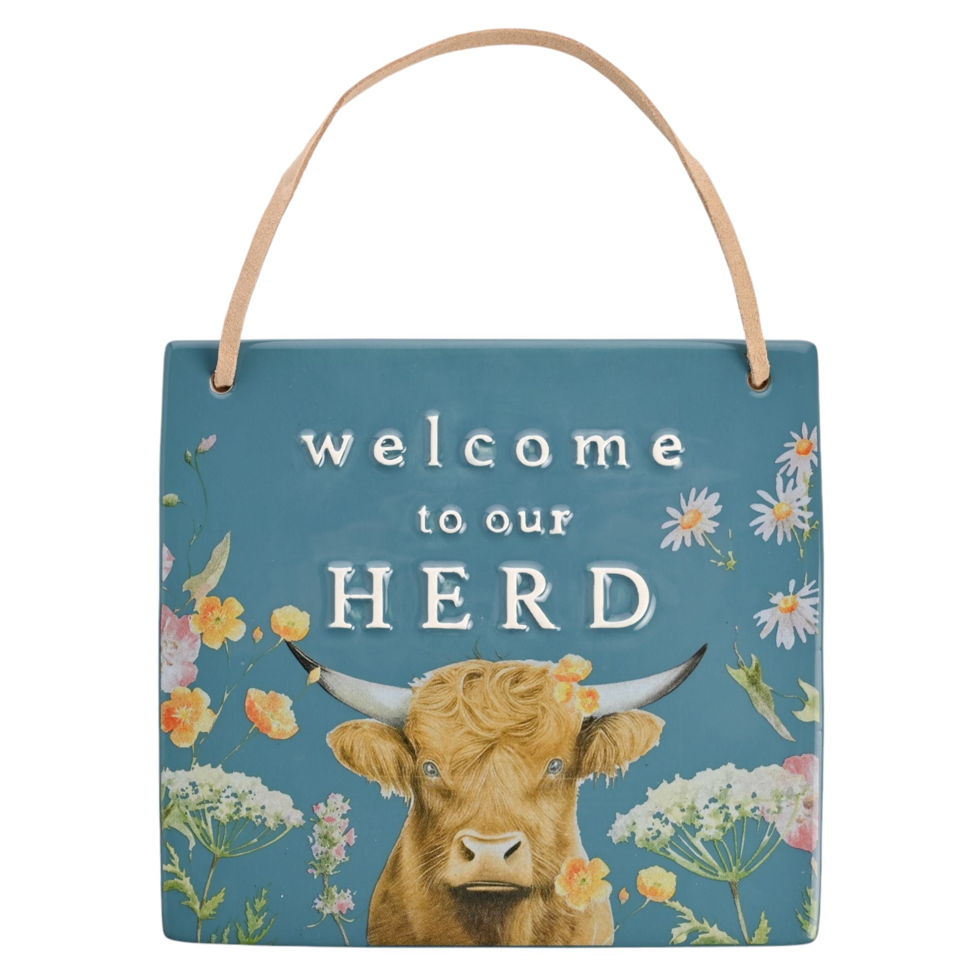 Decorative sign with a cow illustration and 'welcome to our HERD' text on a blue background.